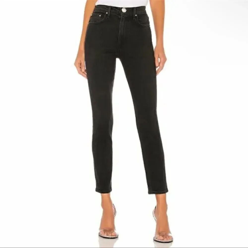 GRLFRND Karolina High-Rise Skinny Jeans in Fireworks Black Wash.